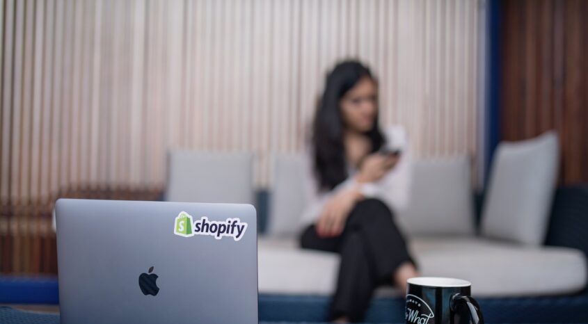 laptop-with-shopify-sticker